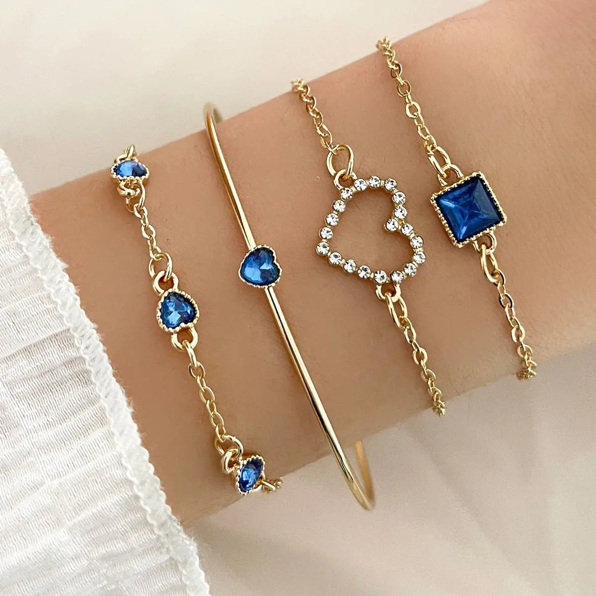 Heart Sparkle – 5-Piece Bracelet Set with Delicate Details